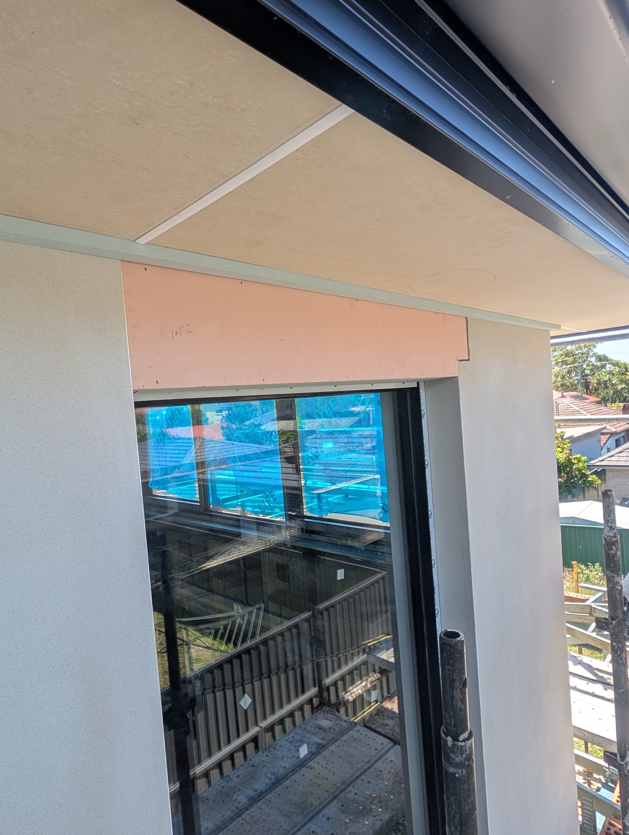 Eaves lining and a window head detail on a rendered new build